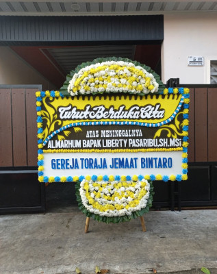 Papan Bunga Duka di Margoagung